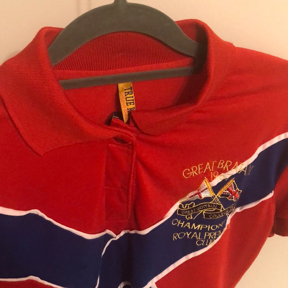 A red shirt with detailing.